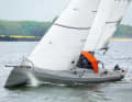 Features: fixed canopy, slopes and edges, wave piercer bow. Many components were still being trialled
