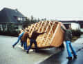 Manual labour: A group of ambitious neighbours is all that is needed to turn the hull. The empty shell doesn't weigh a tonne