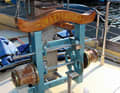A magnificent old cogwheel winch adorns the forecastle. It was once used to move nets and heavy loads on workboats