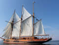 The ship has 540 square metres of sail area, and the large broad jib is set for rough winds