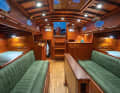 Solidly traditional: symmetrical layout, wide pilot berths, wing bulkheads, but no seat in the navigation area