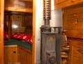 On starboard a small coal stove/wood stove (Davey Hot Pot) on the gaff schooner "Pacific" (Germany, Lauffen) at its berth at the Schiffergilde Bremerhaven