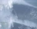 Monster waves as a tourist and surfing attraction in Nazaré, Portugal l Photo: AP Photo/Armando Franca