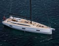 Unmistakably X-Yachts: elongated lines, long and flat cabin superstructure, pleasing appearance