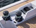 The new cockpit design also allows an improved arrangement of the winches. All sheets, halyards and trim lines are led back to the steering columns