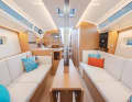 Simple, functional, but not uncomfortable. The lounge is bright and cosy in the visualisations