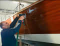 The boat is made of carbon sandwich veneered with wood