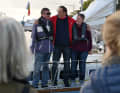 The chairman of Marine Jugend Kieler Förde e.V., Klaas Hartmann-Moritzen, welcomes the two circumnavigators to Kiel.
