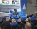 Tense audience in front of the stage in the Sailing Centre in Hall 10