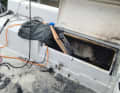 In the new pictures, it looks as if the fire started in the baking box and not in the companionway as previously reported