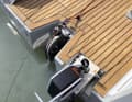 The attached and retractable rudder blade remains well protected in a recess