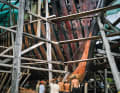 Using old knowledge for a clean future on the world's oceans: Members of the boatbuilding camp in front of the imposing stem of the "Ceiba"