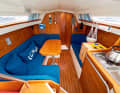 Compromis 777: Folding, lowerable saloon table, on some models a flap in the main bulkhead for the feet of large saloon bench sleepers and the dog bunk that can be converted into storage space. However, the headroom of around 1.70 metres is tight