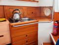 Compromis 777: The galley with handle even for the smallest. Great: rubbish hatch in the back box