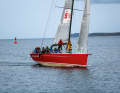 The twelve-man crew of the "Haspa Hamburg" at the finish line off Travemünde