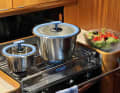 The pots are available in five sizes and fit well on the standard gas cookers on board.