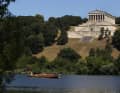 The replica Roman patrol boat "Fridericiana Alexandrina Navis" sails past the Valhalla near Regensburg on its journey to the Black Sea.