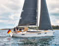 Laminate: Fibres glued with foil in the direction of the load result in sails with a higher profile in stronger winds and over the years. Depending on the fibre used, there are big differences in performance, durability and price