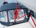 Delphia 34: The traveller helps with trim, but is only optional. The mainsheet leads back to the roof winch on one side - not a single-handed solution