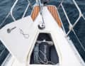 Delphia 34: Forward-opening pulpit, plus side steps: a perfect arrangement for boarding or disembarking via the bow. The forepeak is divided: Anchor locker forward, small load for fenders and sheets aft - great