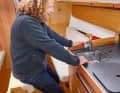 Delphia 34: You can lean against the saloon table while working in the galley