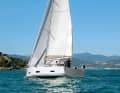 Relaxed. The main boom is attached low on the mast. This makes it easier to set and hoist the sails