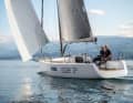 Spacious. Plenty of space in the long, open cockpit, even for more than just two. There is plenty of storage space aft