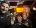 Here Boris and his team celebrate their 24-hour world record