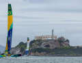 Here, the German and Brazilian teams race past the notorious Alcatraz Island.