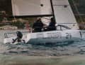 The hull has very little freeboard. You sit very close to the water, similar to a dinghy