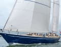 Large overlapping genoa, long overhanging stem, mizzen. Back then