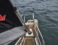The furling system is recessed in the anchor locker. A ladder is integrated into the step