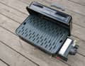 The feet of the Weber grill are simply folded up and then lock the lid for transport or storage.