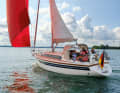 Solid wooden rubbing strake, wide running decks, the Sirius is well thought out. The attached stern extension is visible