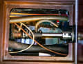Leak two: The leaking grease packing was replaced by a Volvo seal. It is now tight, the water is coming from aft