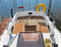 Large, but not ideally divided cockpit. Helmsman and foresailor interfere with each other