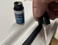 Our epoxy repair on the lid of a back box was practically invisible after the paint had dried