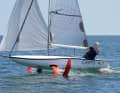 The J-Foils stay down permanently in windy conditions. In a double pack, they ensure an upright, stable ride