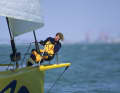 Chatherine Chabaud at the peak of her career as a professional sailor on the bow of the "Whirlpool-Europe 2"...