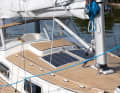 Teak handrails and plastic deck harmonise well