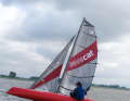 The inflatable hulls flex a little, so you need a little dexterity on the sheet and tiller to remain stable on a hull.