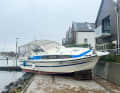 After the storm surge: motor yachts on the promenade