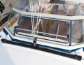 The mainsheet traveller was not up to the load. The car hooked and was difficult to haul even with the winch