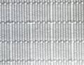 Hybrid: The combination of a high-quality polyester fabric (thin yarns) and thicker threads of high-strength fibres (here: Dyneema/Hydranet) creates a considerably stronger fabric that is popular with blue water sailors, but also costs considerably more