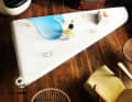 Cheers! This table used to be a part of the fuselage, more precisely the prow of "Geronimo".