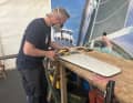 While the shipyard normally takes care of yachts from the ORC and cruising sector, a lot of work was carried out on dinghies during Kieler Woche