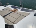 The sunbed and solar panels share the foredeck