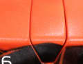 The connecting bolts for the beams are located under the covers