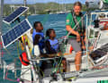 In contact with children on the island: German Christian Sauer trains a few local schoolchildren on board his "Argo".