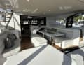 The large bimini spans the entire cockpit. Up to 12 people can sit comfortably at the table